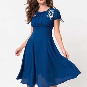Unique Vintage Ava Blue 1940s Swing Dress